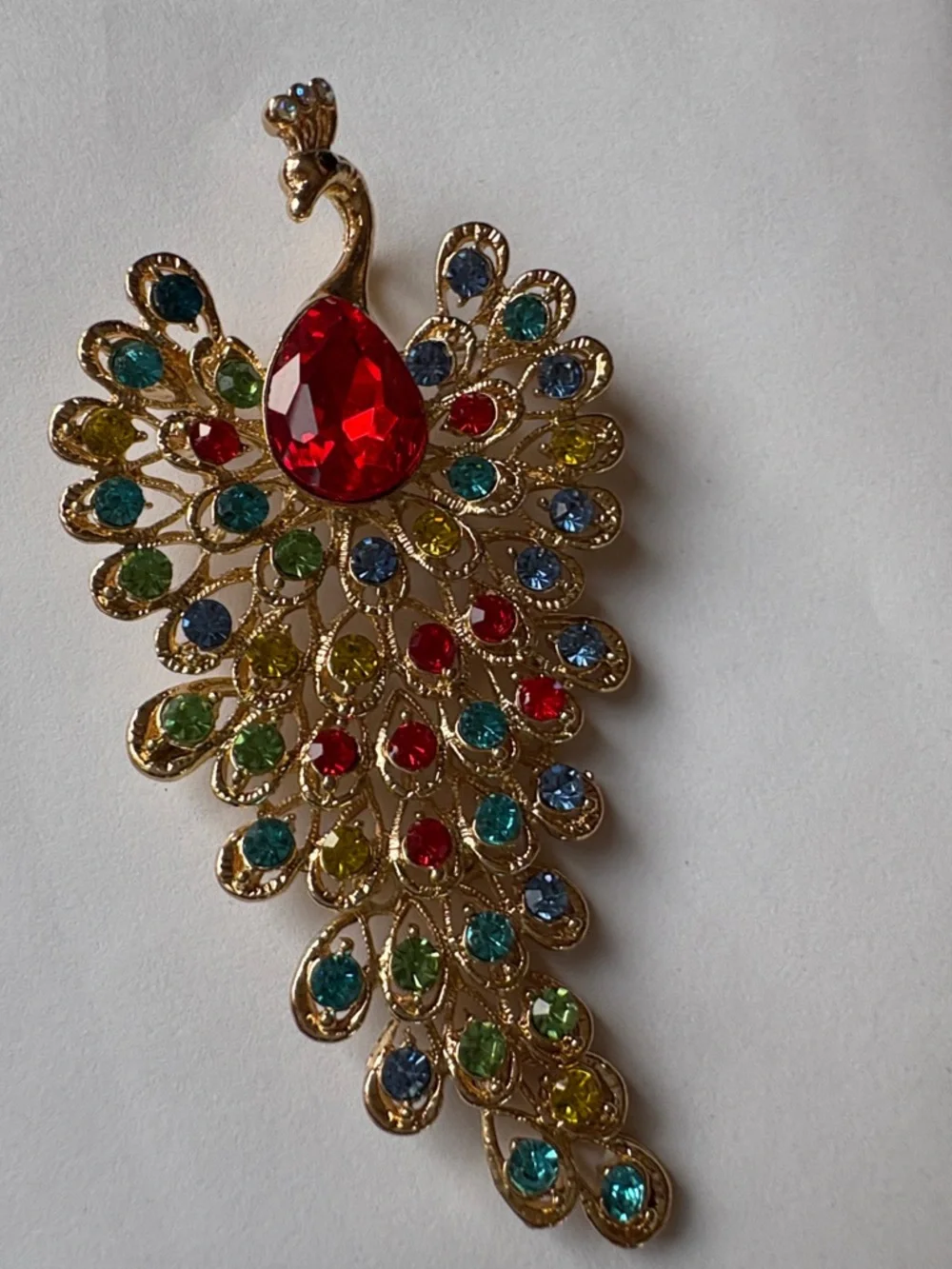 Gold Peacock Brooch with Multicolor and Red Center